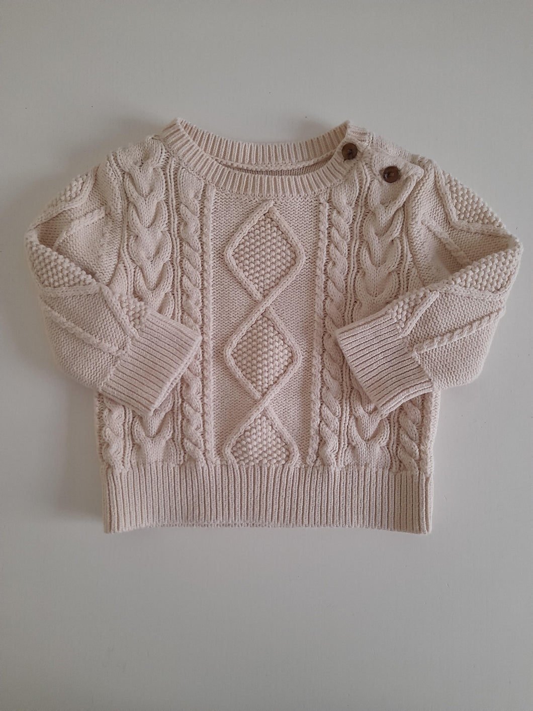 Pull en tricot torsadé crème <b>Baby Gap</b>